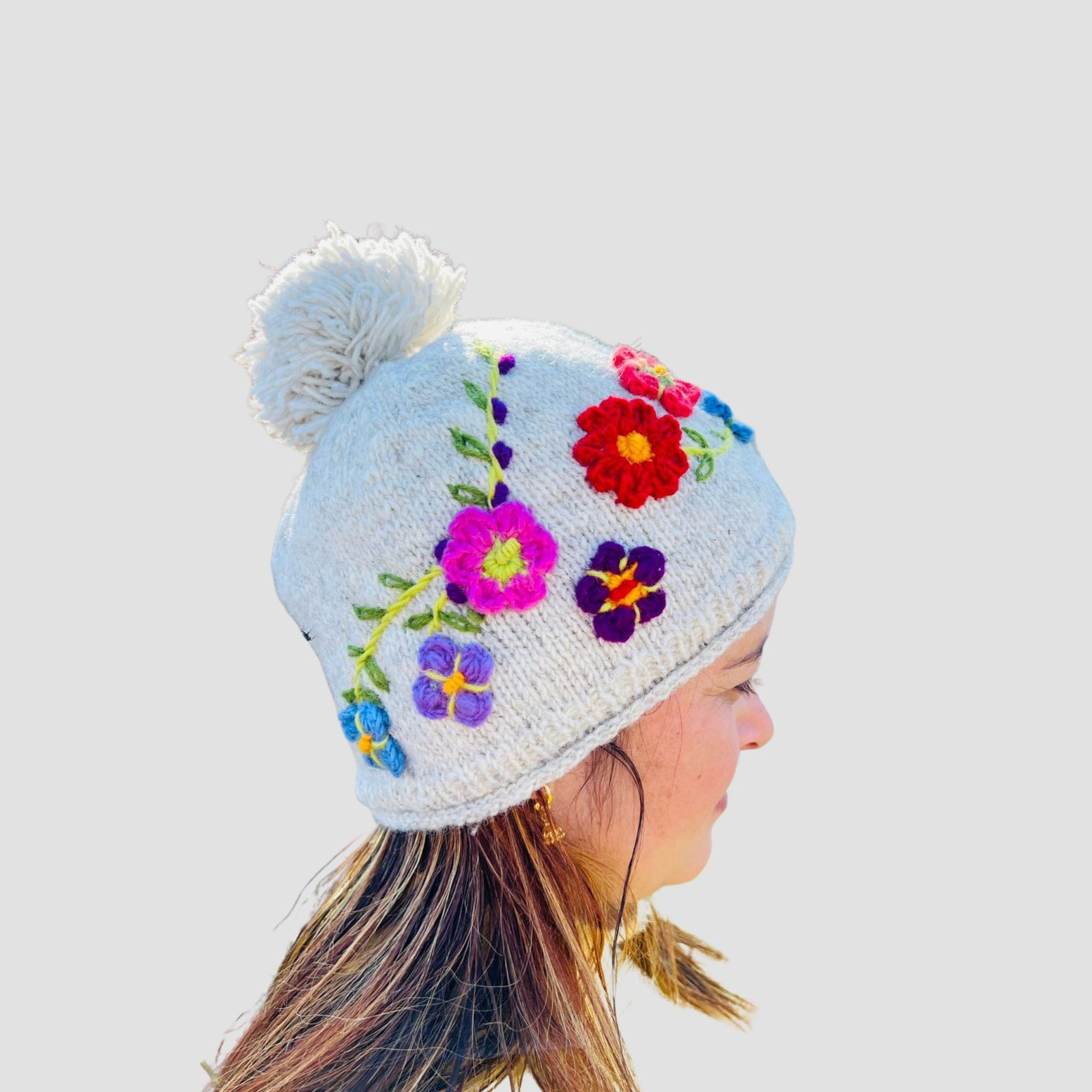 Hand-Knitted Woolen Hat with Fleece Lining – Floral Embellished