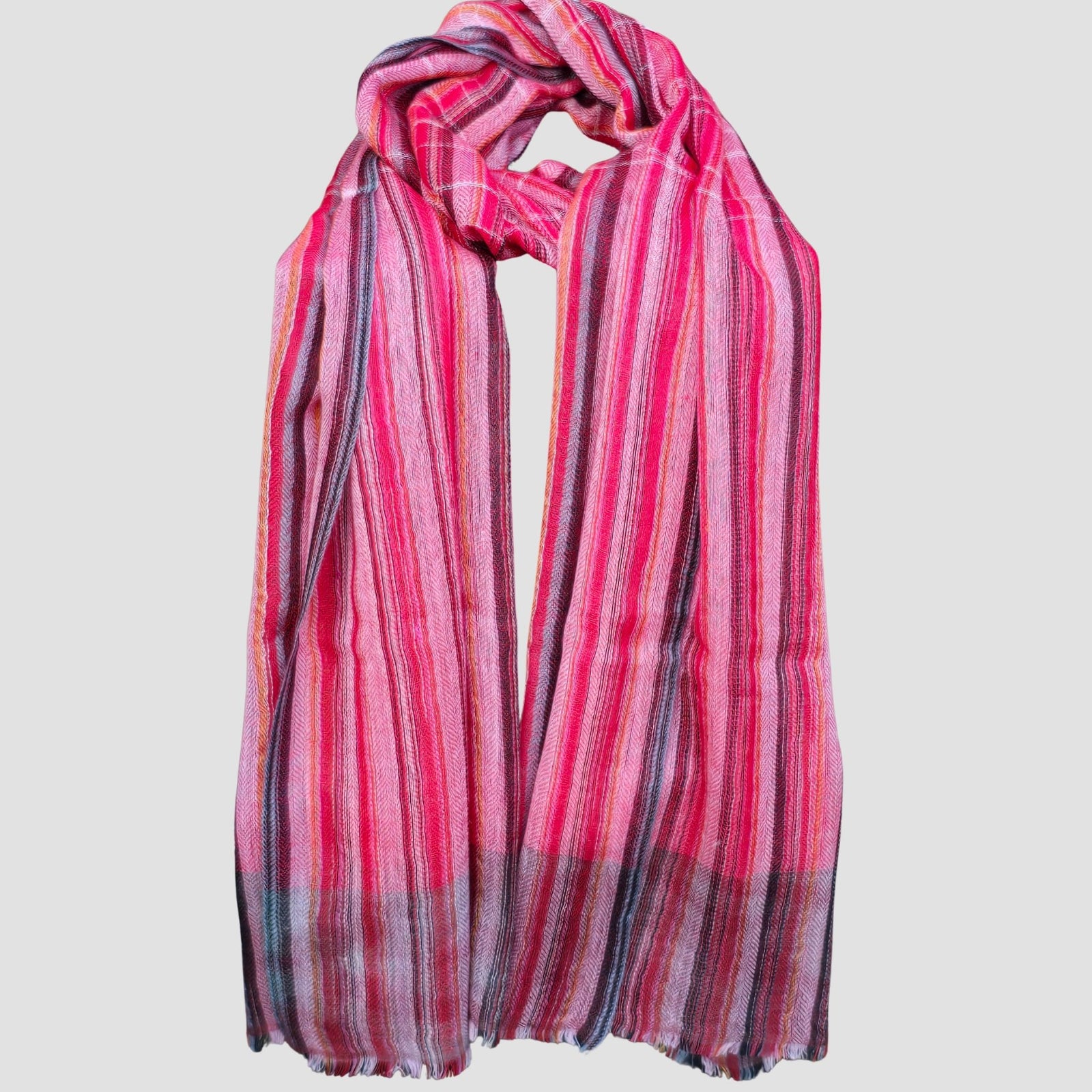 Pink and multicolor stripe pure cashmere scarf looped showing lightweight drape handmade in Nepal