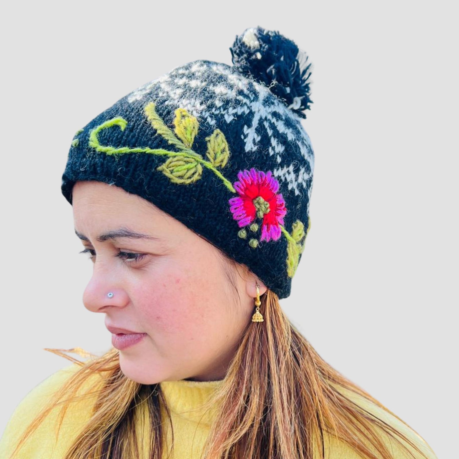 Hand-Knitted Floral Wool Pom Pom Hat | Fair Trade Nepal Beanie