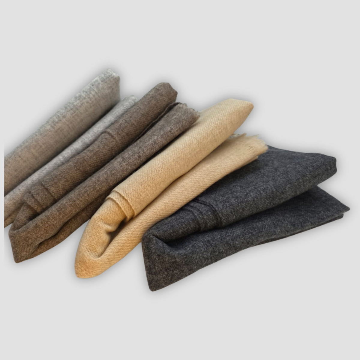 Woman wearing handwoven cashmere shawl, generous wrap Nepal made