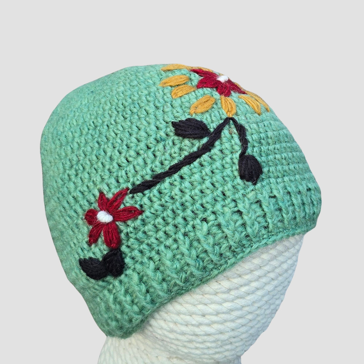 Hand Knitted Wool Beanie — Botanical Embroidered, Fleece Lined, Nepal