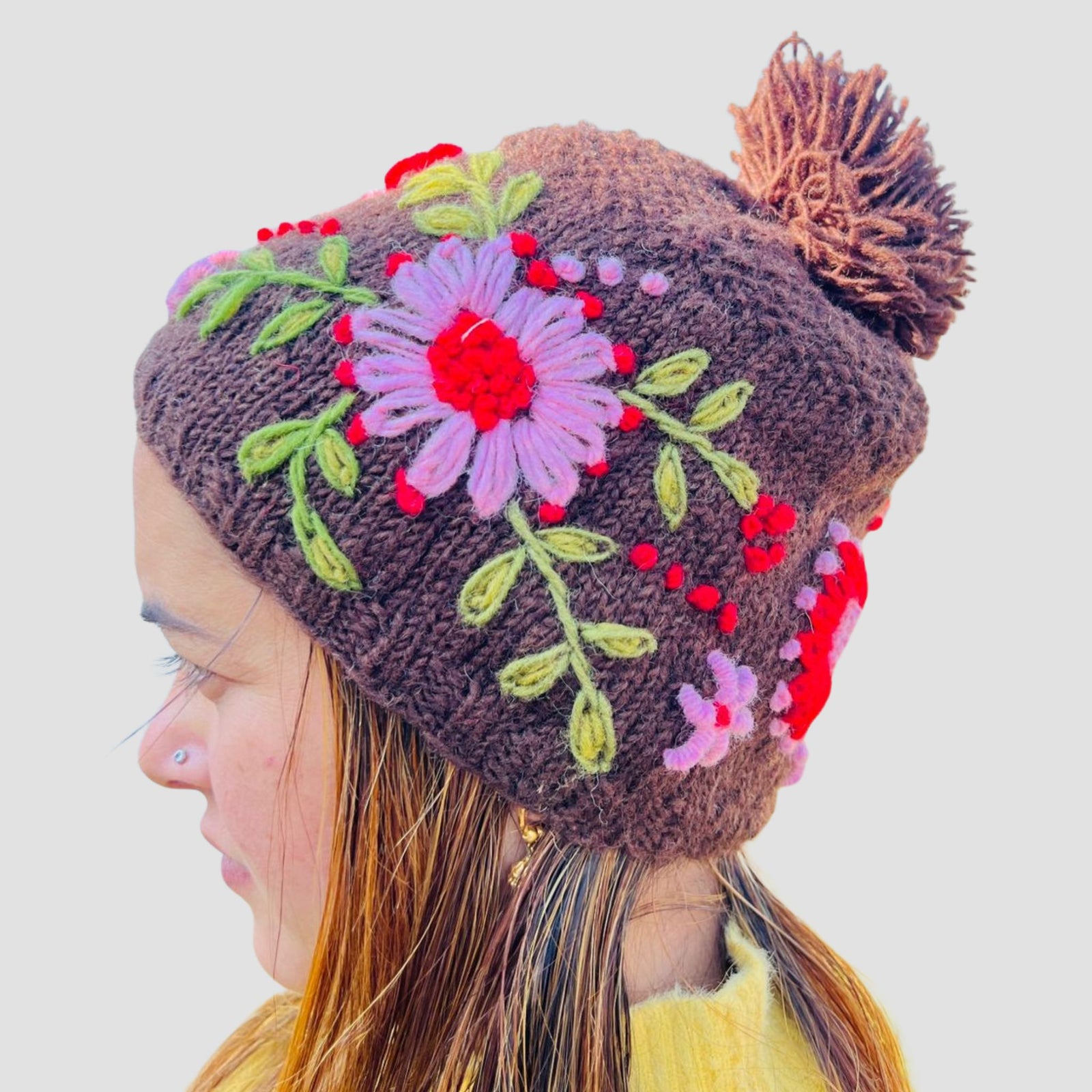 Hand-Knitted Floral Wool Pom Pom Hat | Brown Fair Trade Nepal Beanie