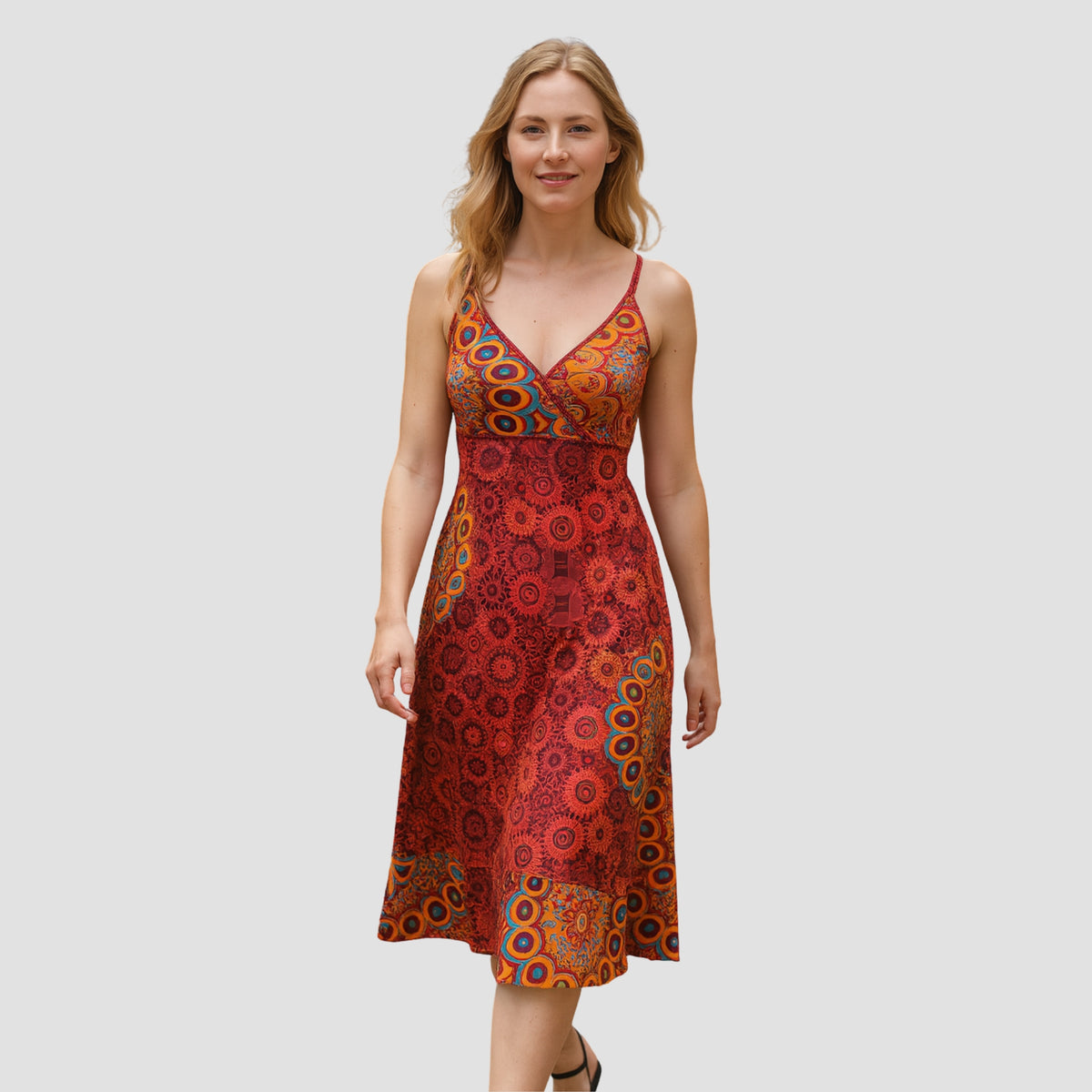 Woman wearing boho-style red dress with floral and mandala hand-block print designs