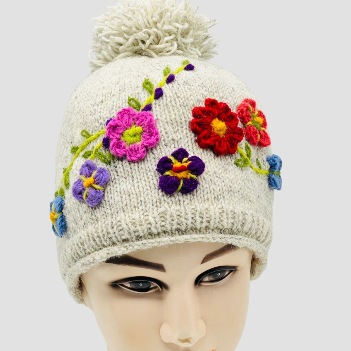 Hand-Knitted Woolen Hat with Fleece Lining – Floral Embellished